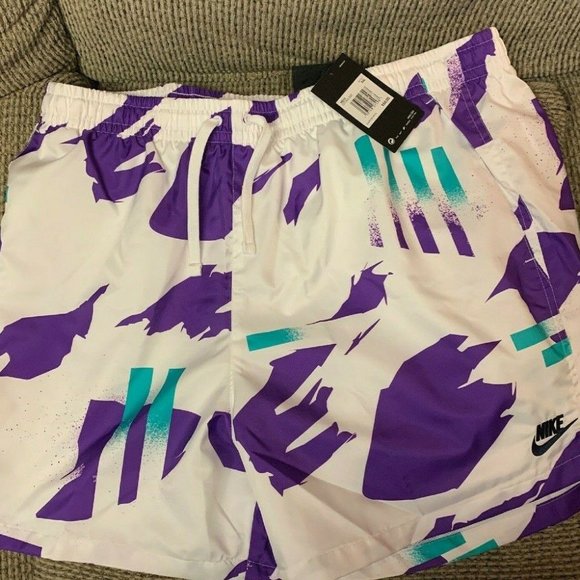 purple nike woven shorts